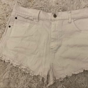 High-rise ruffle-trim jean shorts